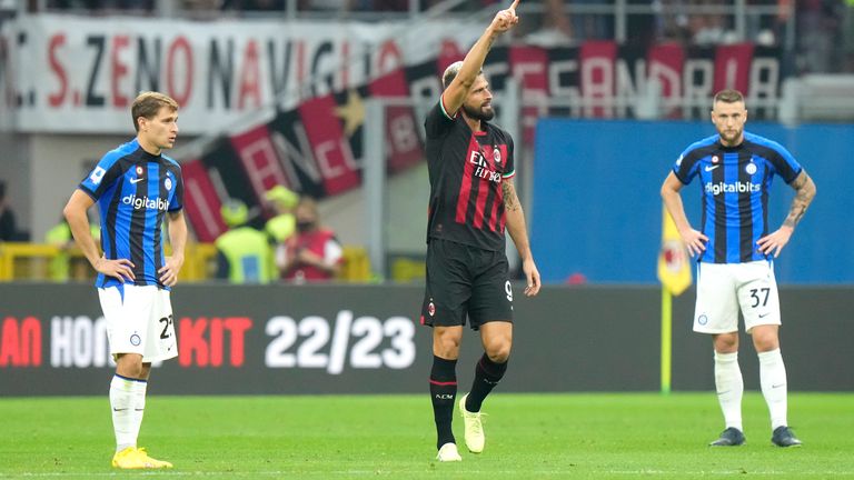 AC Milan&#39;s Olivier Giroud celebrates after scoring against Inter in the derby