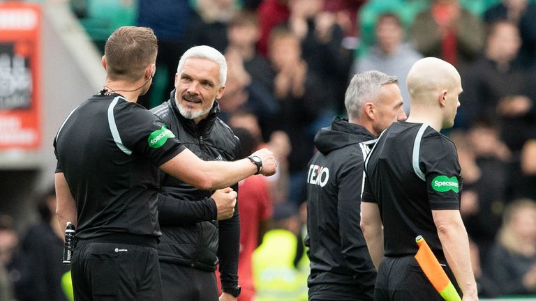 Aberdeen Manager Jim Goodwin argues with referee David Dickinson at full time