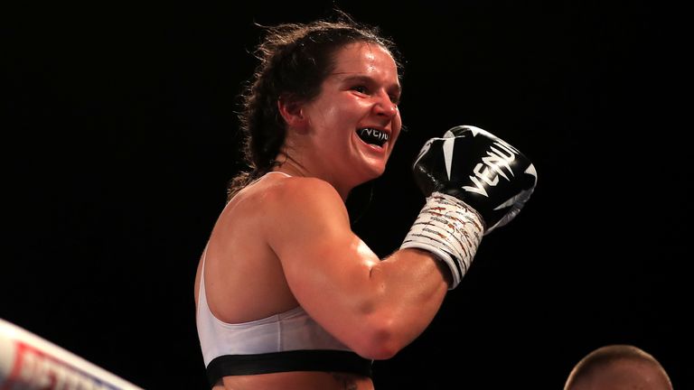 Terri Harper celebrates victory in the WBA and IBO World Super Welterweight titles fight