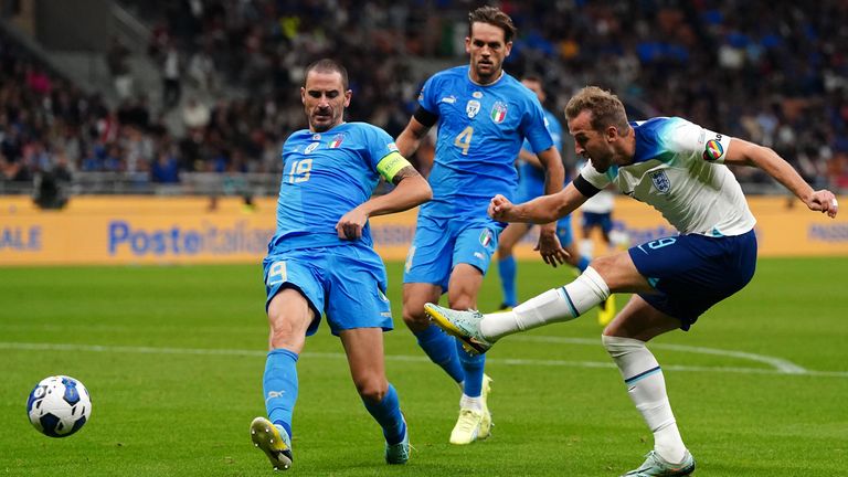 Harry Kane takes a shot on goal for England against Italy in the San Siro