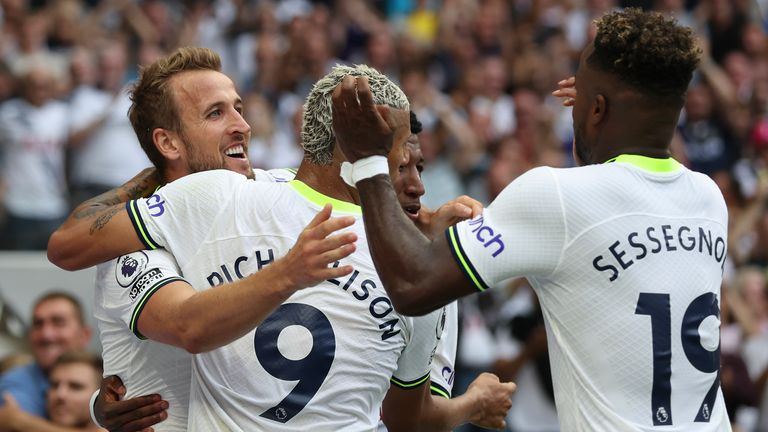 Tottenham's Harry Kane celebrates with team-mates after scoring his side's second goal