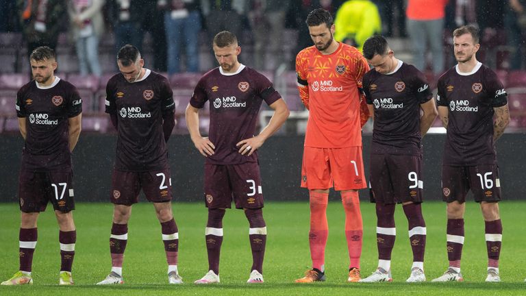 Hearts players observe a minute&#39;s silence