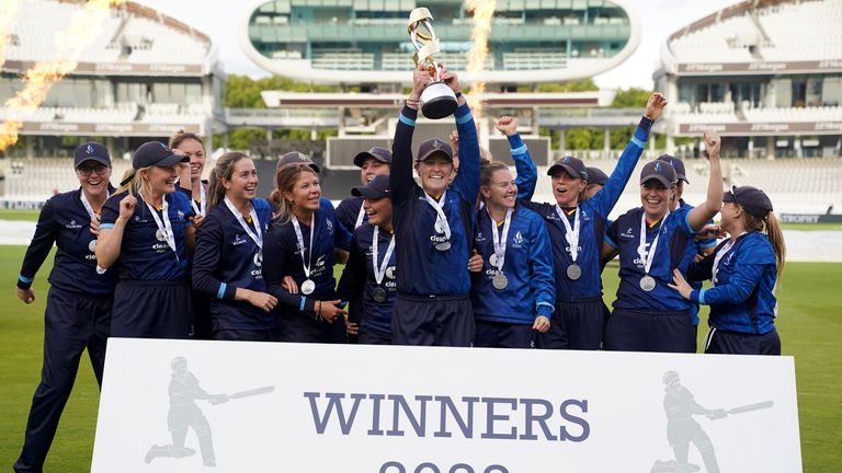 Northern Diamonds' Hollie Armitage lift the Rachael Heyhoe Flint Trophy after they won the Final at Lord's, London 