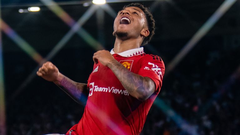 Jadon Sancho leaps in celebration after scoring Manchester United's opening goal against Leicester