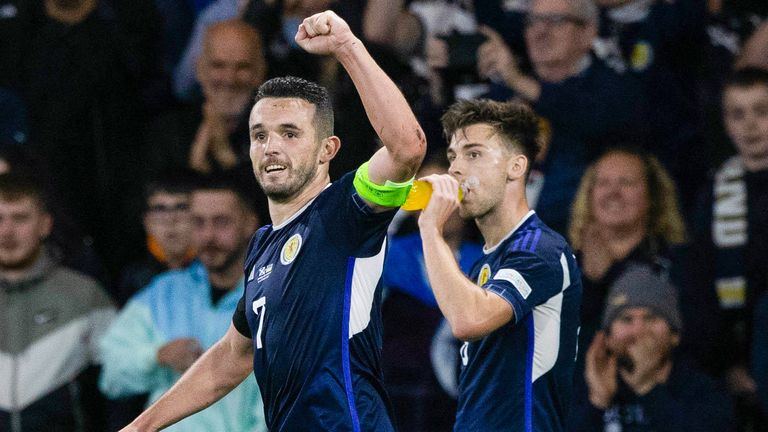 Scotland&#39;s John McGinn celebrates scoring to make it 1-0  against Ukraine in Nations League