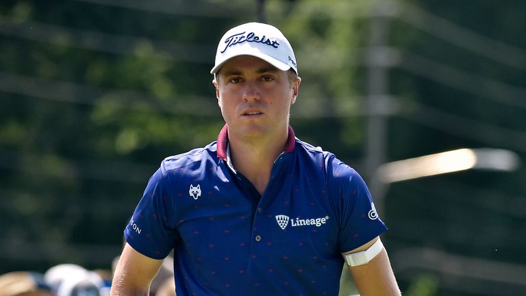 Justin Thomas heads towards the fairway of the eighth hole