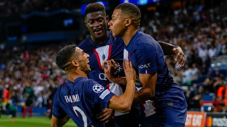 Kylian Mbappe, right, is congratulated by PSG team-mates after scoring his second goal vs Juventus