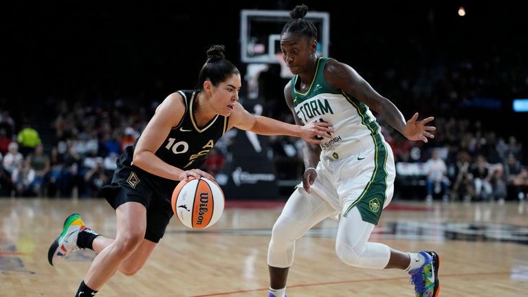 Las Vegas Aces guard Kelsey Plum drives against Seattle Storm guard Jewell Loyd during the first half in Game 2 of a WNBA basketball semifinal playoff series 