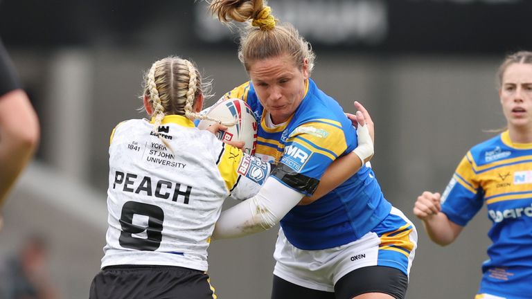 Picture by John Clifton/SWpix.com - 18/09/2022 - Rugby League - Betfred Womens Super League Grand Final - York City Knights v Leeds Rhinos - The Totally Wicked Stadium, St Helens, England -
Leeds Rhinos' Emma Lumley in action with York City Knights' Grace Field