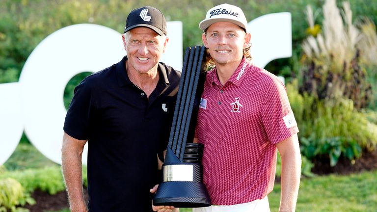 LIV Golf CEO Greg Norman, left, poses with champion Cameron Smith at the LIV Golf Invitational-Chicago tournament Sunday, Sept. 18, 2022, in Sugar Hill, Ill. (AP Photo/Charles Rex Arbogast)
