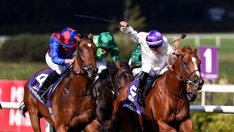 Luxembourg and Ryan Moore (left) win the Group One Irish Champions Stakes