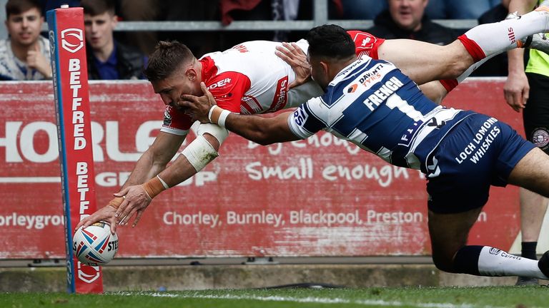 St Helens&#39; Tommy Makinson scores their sides first try during the Betfred Super League match at the Totally Wicked Stadium, St Helens. Picture date: Friday April 15, 2022.