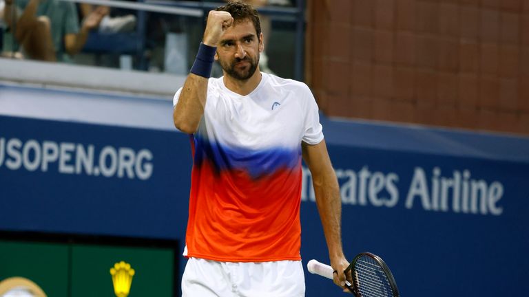 Marin Cilic, of Croatia, celebrates winning a point against Daniel Evans, of the United Kingdom, during the third round of the U.S. Open tennis championships, Saturday, Sept. 3, 2022, in New York. (AP Photo/Jason DeCrow)