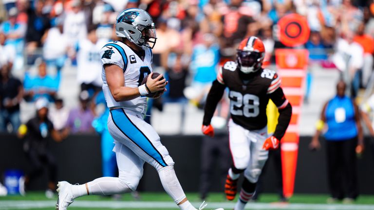 Carolina Panthers quarterback Baker Mayfield scores against the Cleveland Browns during the second half of an NFL football game on Sunday, Sept. 11, 2022, in Charlotte, N.C.(AP Photo/Jacob Kupferman)


