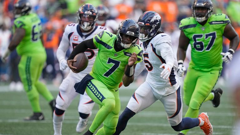 Seattle Seahawks quarterback Geno Smith (7) scrambles against the Denver Broncos during the first half of an NFL football game, Monday, Sept. 12, 2022, in Seattle.