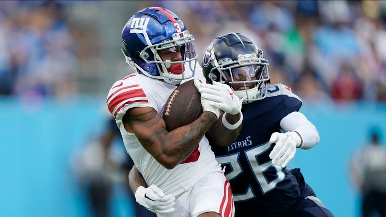 New York Giants wide receiver Sterling Shepard (3) breaks away from Tennessee Titans cornerback Kristian Fulton (26) for a touchdown after making a catch during the second half of an NFL football game Sunday, Sept. 11, 2022, in Nashville. (AP Photo/Mark Humphrey)


