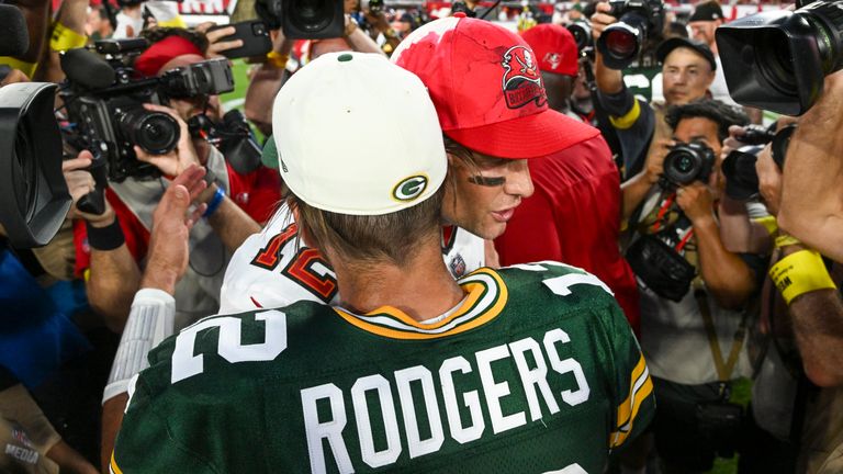 Green Bay Packers' Aaron Rodgers hugs Tampa Bay Buccaneers' Tom Brady 