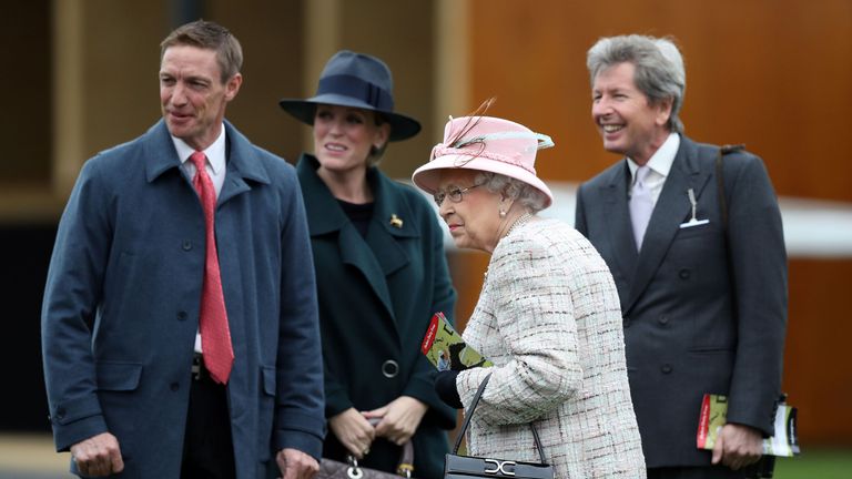 The Queen with Richard Hughes (left) in the parade ring
