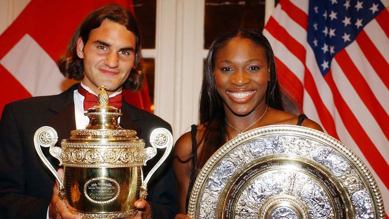 Wimbledon men's singles tennis champion Roger Federer, left, and women's singles champion Serena Williams pose with their trophy at the Savoy Hotel