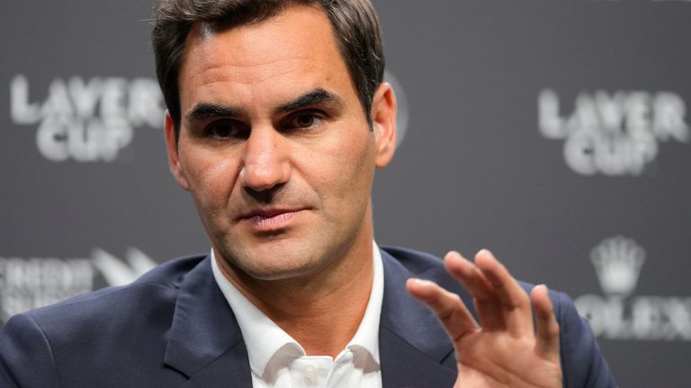 Switzerland's Roger Federer gestures during a media conference ahead of the Laver Cup tennis tournament at the O2 in London, Wednesday, Sept. 21, 2022. Federer will meet with the media Wednesday to discuss walking away from the game at age 41 after 20 Grand Slam titles. (AP Photo/Kin Cheung)