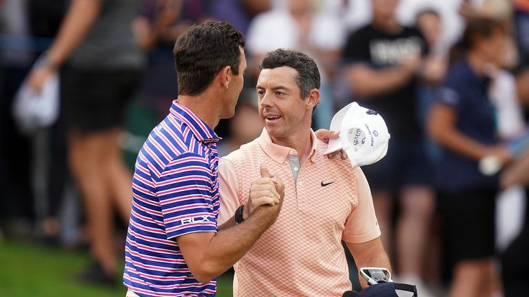 Rory McIlroy (right) and Billy Horschel shake hands after their rounds during day three of the BMW PGA Championship