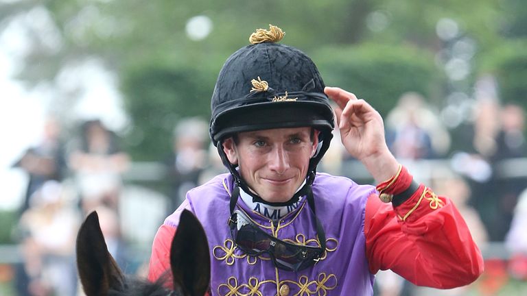 Jockey Ryan Moore salutes The Queen after winning the 2013 Gold Cup on Estimate