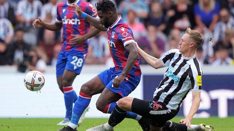 Newcastle United's Sean Longstaff (right) challenges Crystal Palace's Jeffrey Schlupp