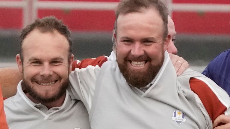 Team Europe's Shane Lowry and Team Europe's Tyrrell Hatton celebrate on the 18th hole after winning their four-ball match the Ryder Cup at the Whistling Straits Golf Course Saturday, Sept. 25, 2021, in Sheboygan, Wis. (AP Photo/Charlie Neibergall)