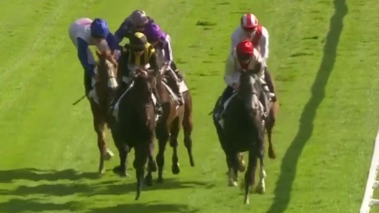 Christophe Soumillon leans out with his elbow and knocks Rossa Ryan off balance