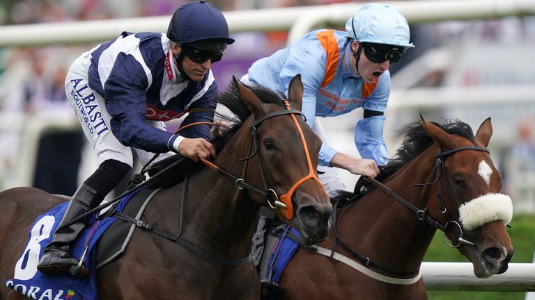 Trillium (left) and Pat Dobbs win the Flying Childers Stakes from The Platinum Queen and Oisin Orr