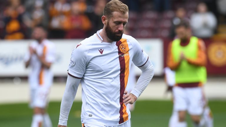 Kevin van Veen looks on dejected after missing a penalty for Motherwell