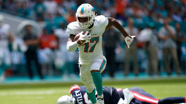 Miami Dolphins wide receiver Jaylen Waddle (17) runs for a touchdown during the first half of an NFL football game against the New England Patriots, Sunday, Sept. 11, 2022, in Miami Gardens, Fla. (AP Photo/Lynne Sladky)


