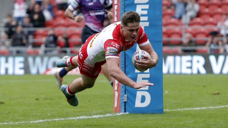 St Helens' Jack Welsby scores their sides third try during the Betfred Super League match at the Totally Wicked Stadium, St Helens. Picture date: Saturday September 3, 2022.