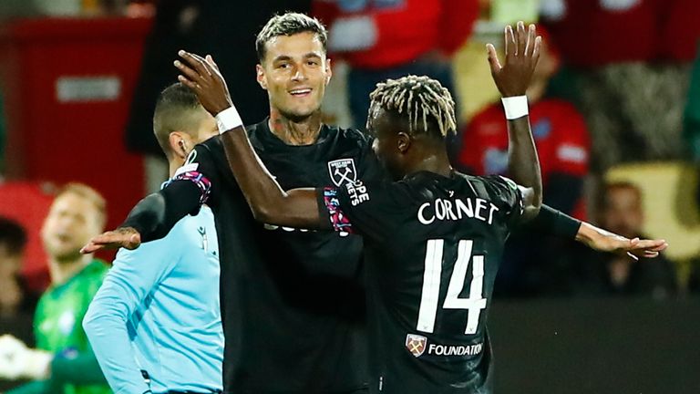 West Ham's Gianluca Scamacca, center left, celebrates after scoring vs Silkeborg