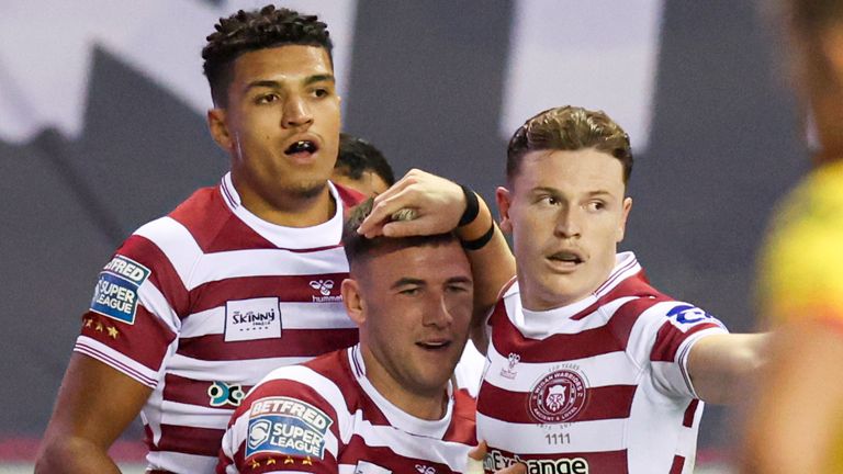 Harry Smith of Wigan Warriors celebrates scoring the first try against Catalans Dragons (swpix.com)