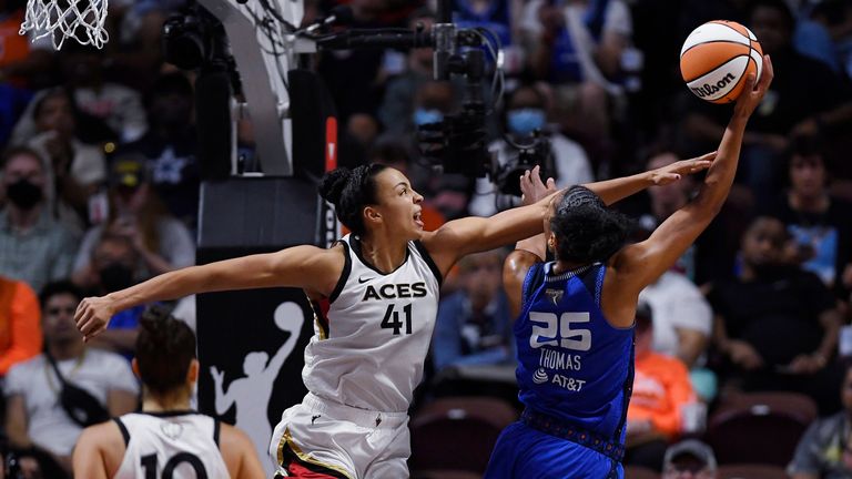 Connecticut Sun&#39;s Alyssa Thomas shoots as Las Vegas Aces&#39; Kiah Stokes (41) defends during the second half in Game 3 of basketball&#39;s WNBA Finals, Thursday, Sept. 15, 2022, in Uncasville, Conn. (AP Photo/Jessica Hill)


