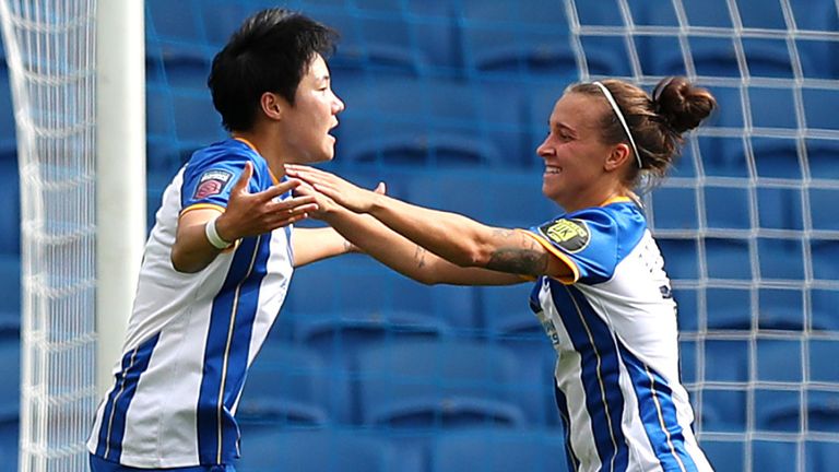 Lee Geum-Min celebrates after giving Brighton the lead against Reading
