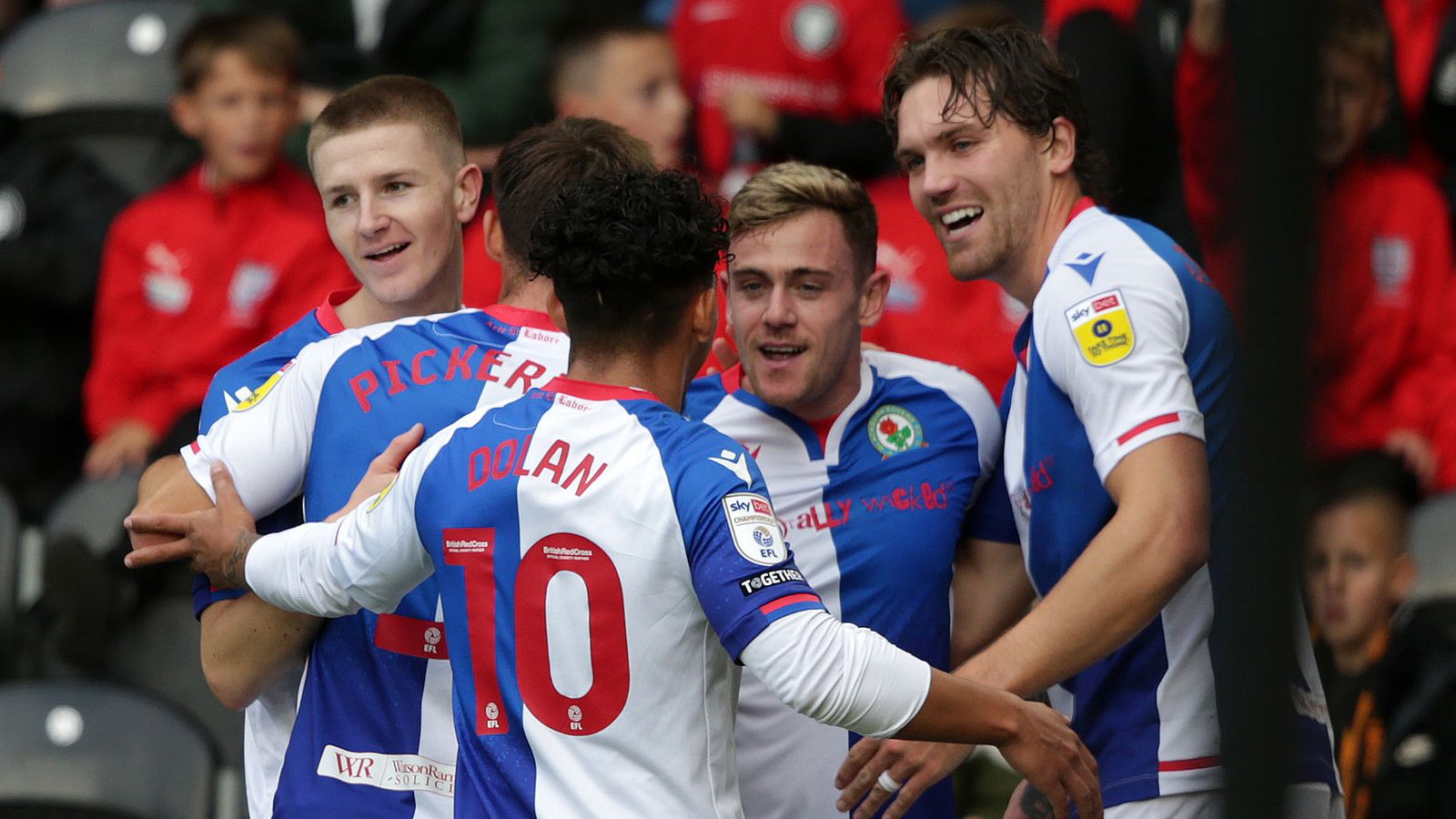  Sammie Szmodics celebrates scoring a goal for Blackburn Rovers with his teammates.