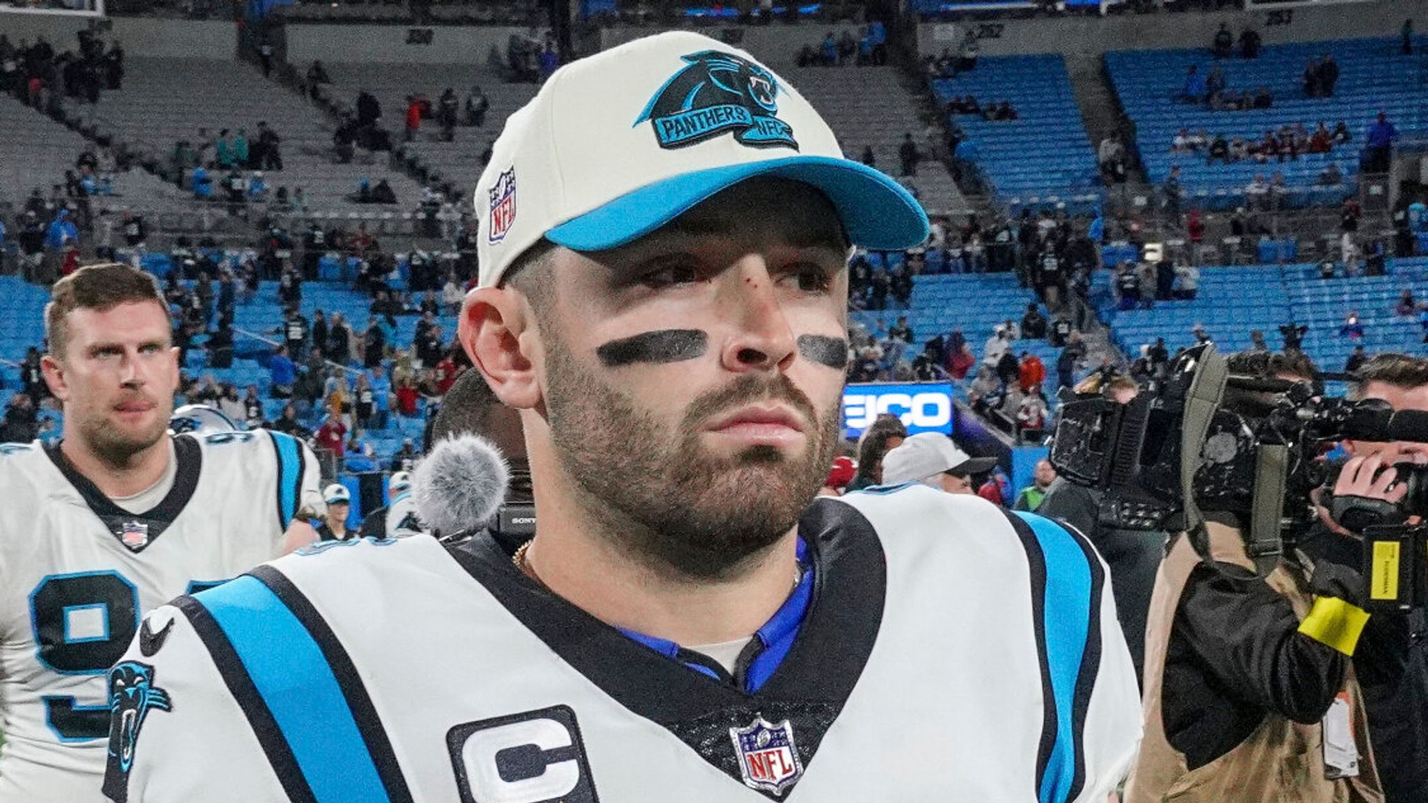 Carolina Panthers quarterback Baker Mayfield warms up before an