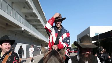 Ricciardo rides down the paddock on a horse!