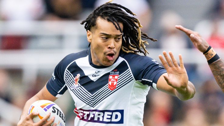 Picture by Will Palmer/SWpix.com - 15/10/2022 - Rugby League - Rugby League World Cup - England v Samoa - St. James' Park, Newcastle, England - Dom Young of England looks to hand off Joseph Suaalii of Samoa