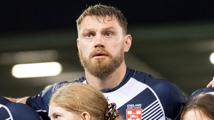 Picture by Allan McKenzie/SWpix.com - 07/10/2022 - Rugby League - World Cup Warm Up - England v Fiji - AJ Bell Stadium, Salford, England - Elliott Whitehead, Victor Radley & Andy Ackers with their mascots.