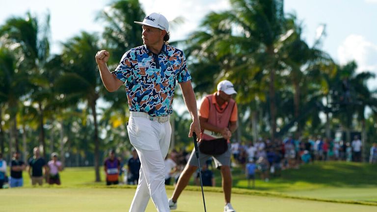 Cameron Smith pumps his fist after a birdie putt against Phil Mickelson on the eighth hole during the first round of the LIV Golf Team Championship at Trump National Doral Golf Club, Friday, Oct. 28, 2022, in Doral, Fla. (AP Photo/Lynne Sladky)