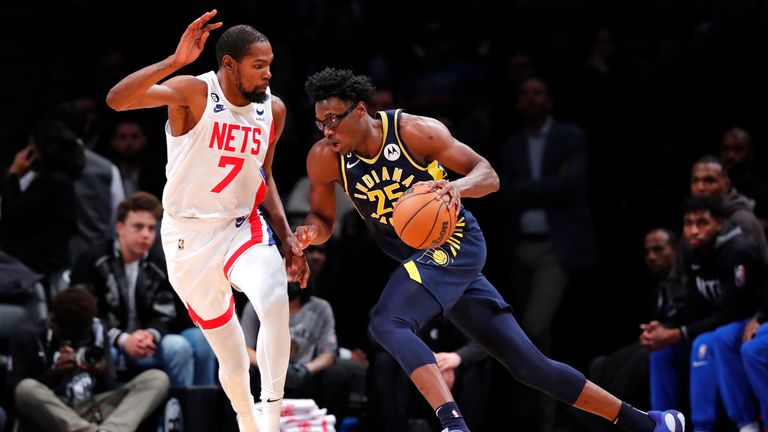 Indiana Pacers forward Jalen Smith (25) drives to the basket against Brooklyn Nets forward Kevin Durant (7) during the second half of an NBA basketball game, Saturday, Oct. 29, 2022, in New York.