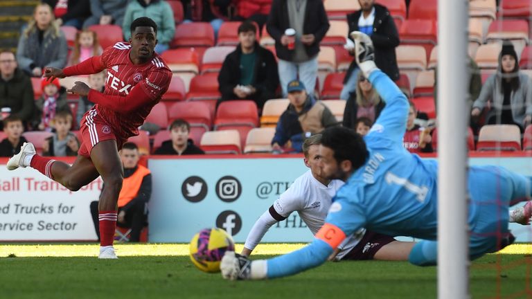 ABERDEEN, SCOTLAND - OCTOBER 16: Hearts&#39; Craig Gordon makes a save from Aberdeen&#39;s Luis Lopes during a cinch Premiership match between Aberdeen and Heart of Midlothian at Pittodrie, on October 16, 2022, in Aberdeen, Scotland. (Photo by Craig Foy / SNS Group)