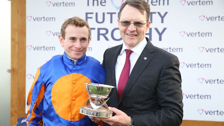 Ryan Moore and Aidan O&#39;Brien celebrate after winning the Vertem Futurity Trophy at Doncaster