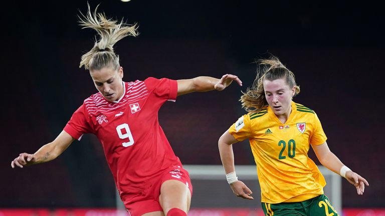 Switzerland's Ana-Maria Crnogorcevic is challenged by Wales' Carrie Jones