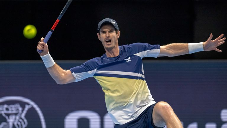 Great Britain&#39;s Andy Murray returns the ball to Russia&#39;s Roman Safiullin during their first round match at the Swiss Indoors tennis tournament at the St. Jakobshalle in Basel, Switzerland, on Tuesday, Oct. 25, 2022. (Georgios Kefalas/Keystone via AP)