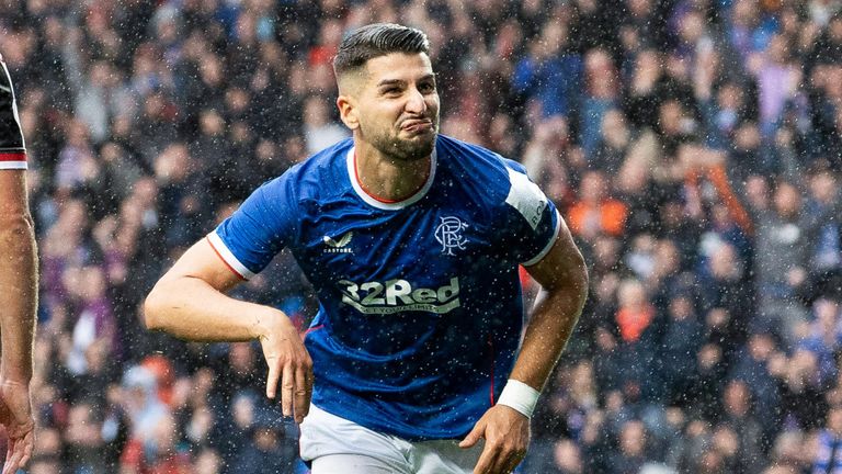 Antonio Colak runs towards the home supporters after scoring his second goal against St Mirren