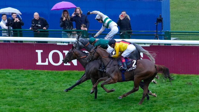 Luke Morris celebrates as Alpinista crosses the line in front in the Arc